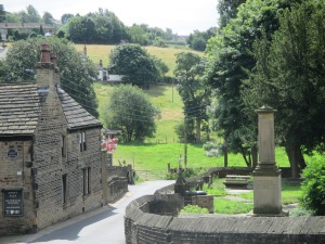 Memorial (front, left) to "commemorate the dreadful fate of seventeen children who fell unhappy victims to a raging fire at Mr Atkinson's factory, Colne Bridge, Feb. 14th. 1818." 